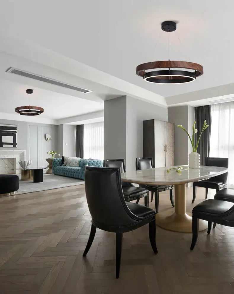 Modern wood and black double circular led chandelier featuring a dark wood ring and black inner band for dining room