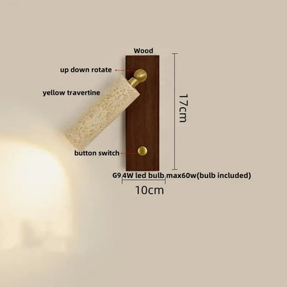 Modern wall light fixture with dark wood base, yellow travertine shade, and brass accents for bedroom use