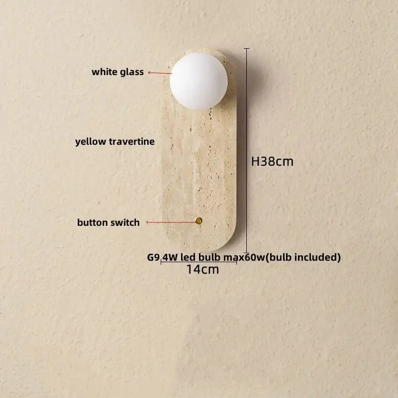 Modern wall light fixture with a white glass globe and textured yellow travertine base featuring an integrated switch
