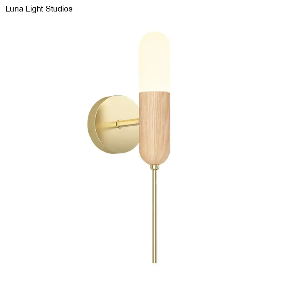 Modern wood and brass led light fixture wall sconce with warm frosted glass shade and brushed brass hardware