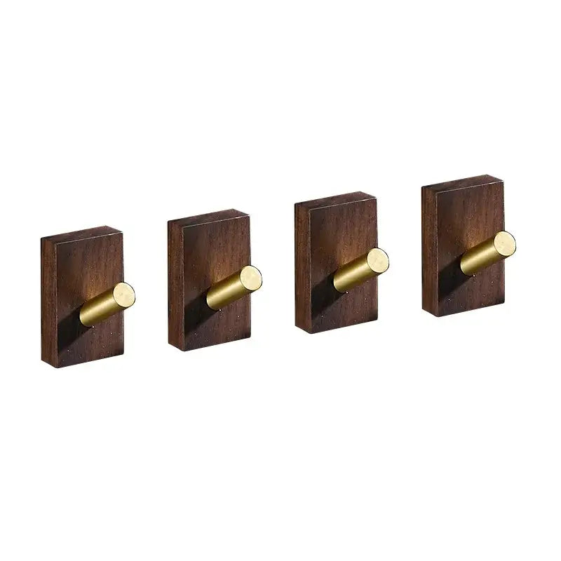 Set of four dark wood wall hooks with brushed gold decorbites brass brushed cylindrical pegs for kitchen use
