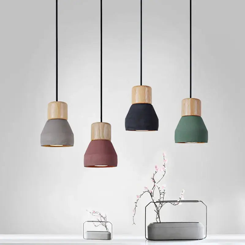 Modern wood and concrete pendant light with matte concrete shades in gray terracotta navy and sage green decorbites concrete pendant