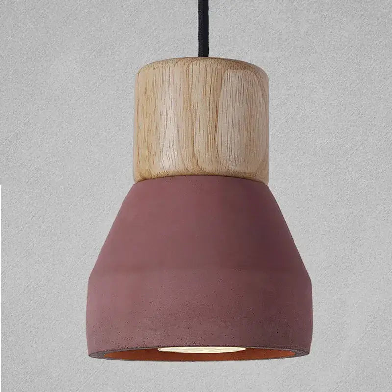 Modern wood and concrete pendant light with matte dusty rose concrete shade and natural wood top by decorbites hanging fixture