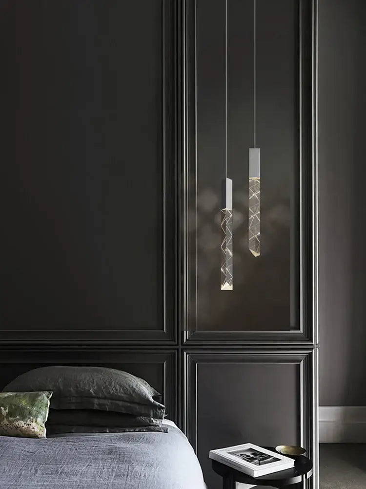 Two modern wood and crystal column led chandelier pendant lights with clear glass and intricate wirework for decorbites crystal column staircases