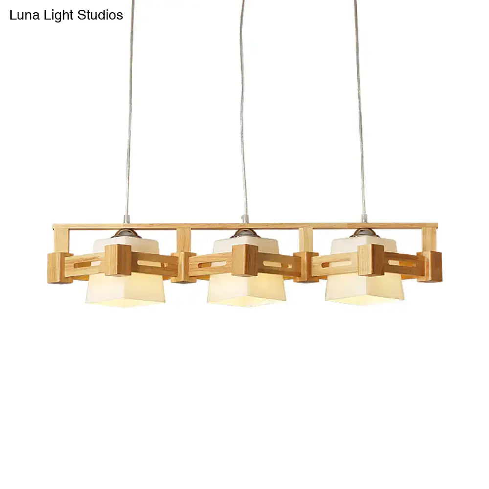 Decorbites modern cubic wooden pendant lamp with three beige milk frosted glass shades for island lighting