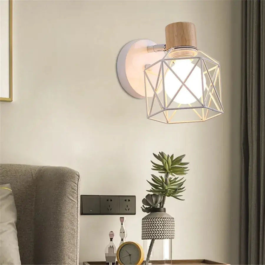 Modern wood and metal wall sconce with geometric wireframe, natural wood top, and white circular backplate for bedroom aisle decorbites led wood wall light