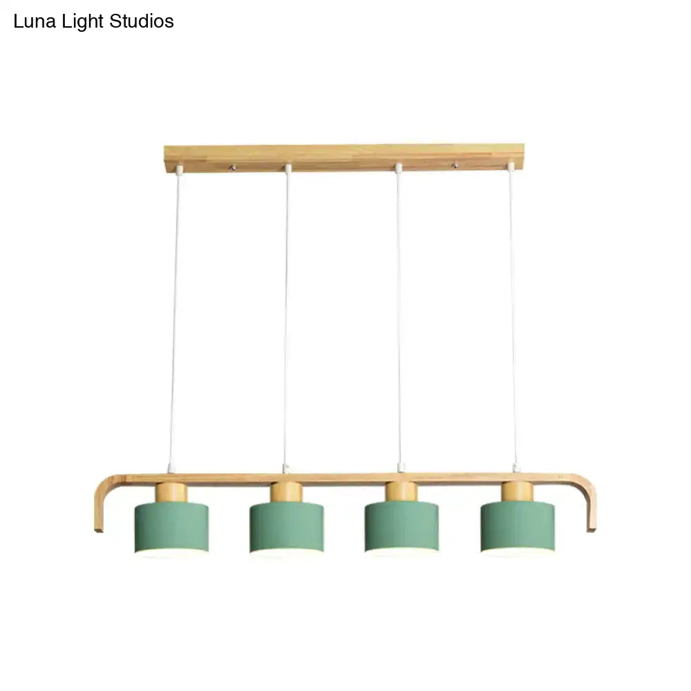 Modern wood and mint green 3 light chandelier with natural wood frame and matte sage green shades for dining room kitchen