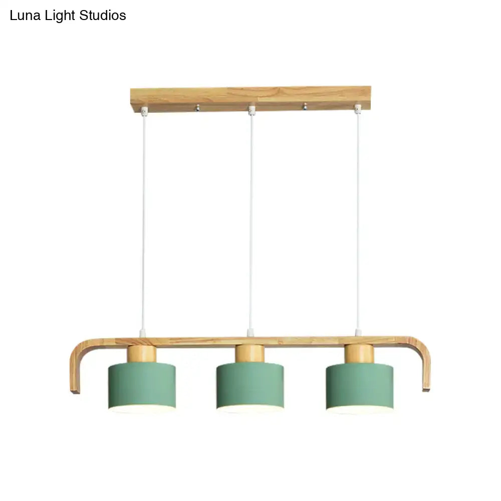 Modern wood and mint green 3 light chandelier with matte sage green shades for dining room kitchen lighting