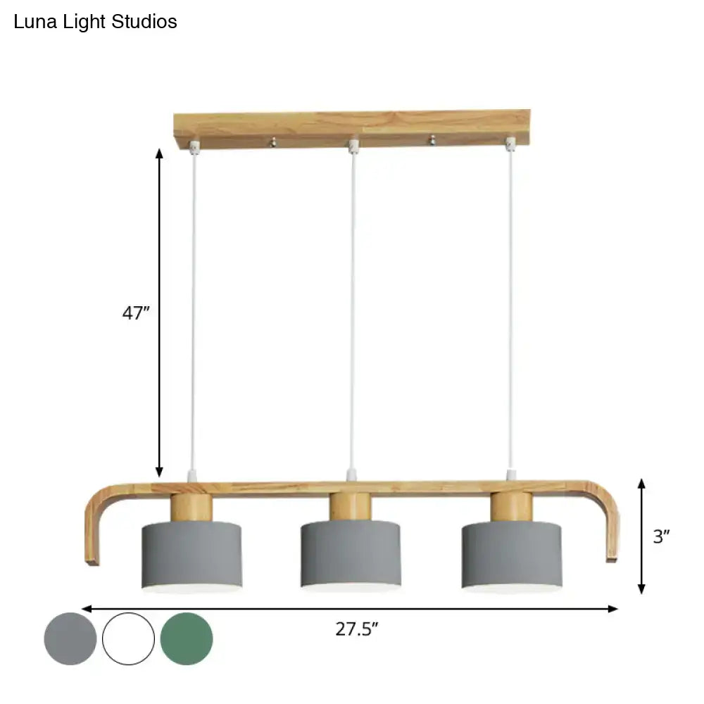 Modern three-light pendant fixture with light wood frame and gray shades ideal for dining room kitchen lighting needs