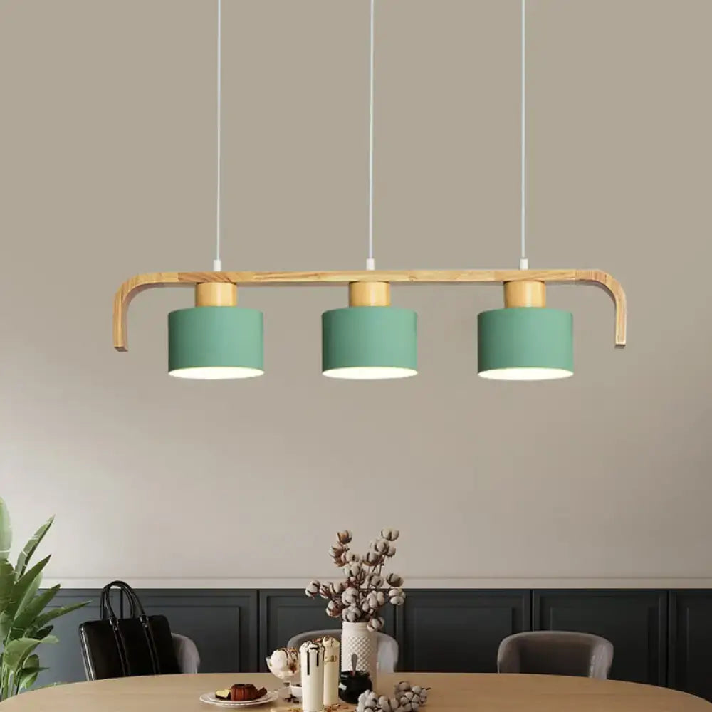 Modern wood and mint green three-light pendant lamp with curved frame ideal for dining room kitchen lighting uses led incandescent fluorescent bulbs
