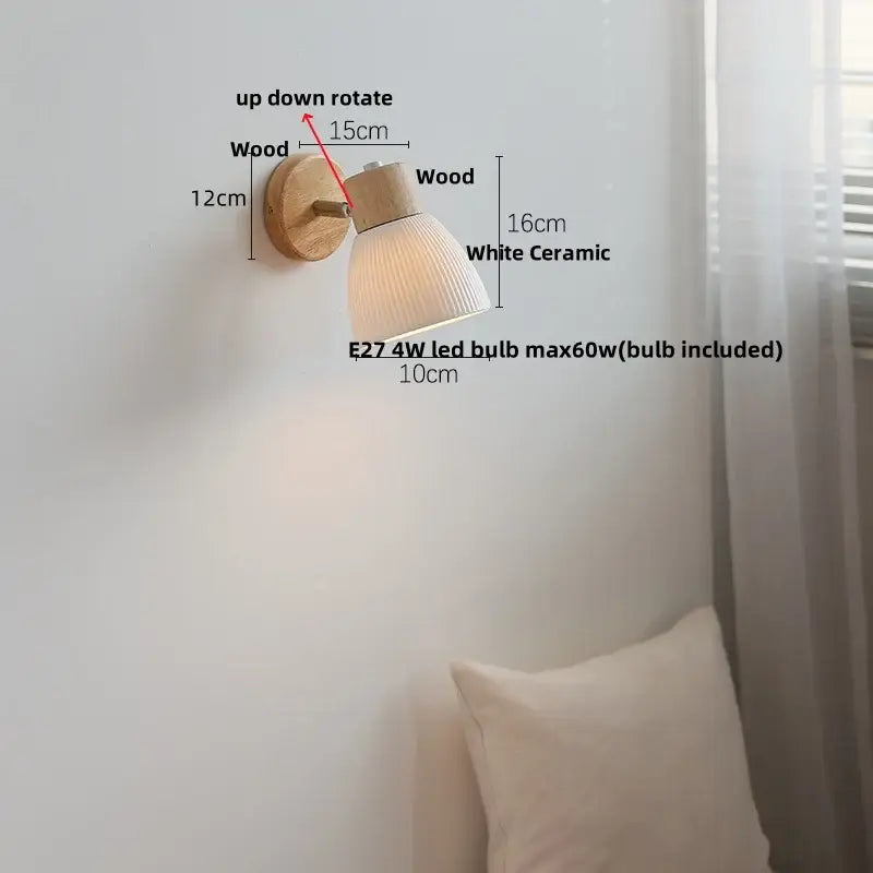 Minimalist wall light fixture with natural wood base and white ribbed ceramic shade for bedroom sconce lighting