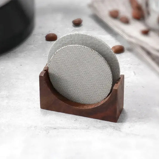 Silver mesh coasters in a dark wood decorbites coffee filter stand for modern coffee filter storage and kitchen decor
