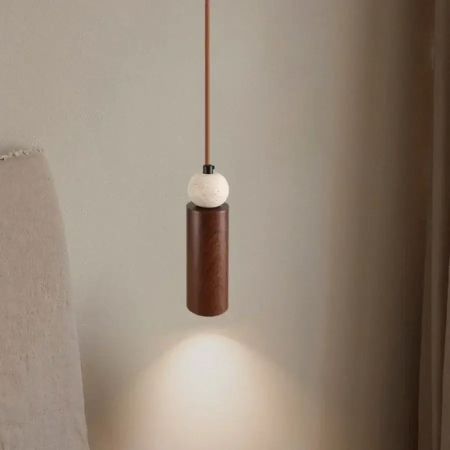 Minimalist decorbites iron led pendant light with dark wood cylindrical body and white textured spherical top for living room