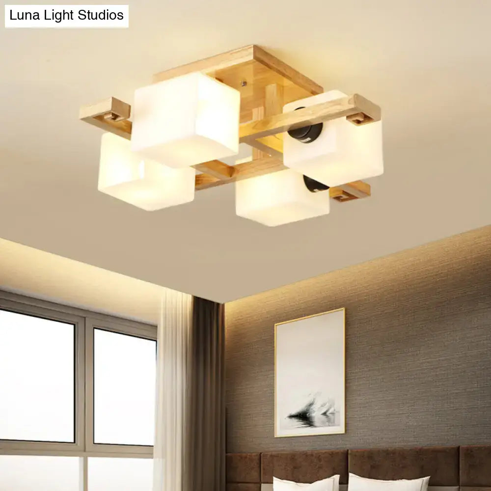 Modern square ceiling light with white glass shades and warm wood canopy for living room lighting by decorbites