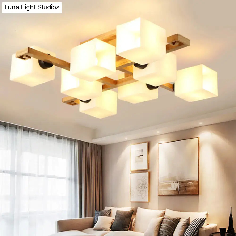 Modern geometric flush mount chandelier with warm white glass shades and wood canopy for living room lighting