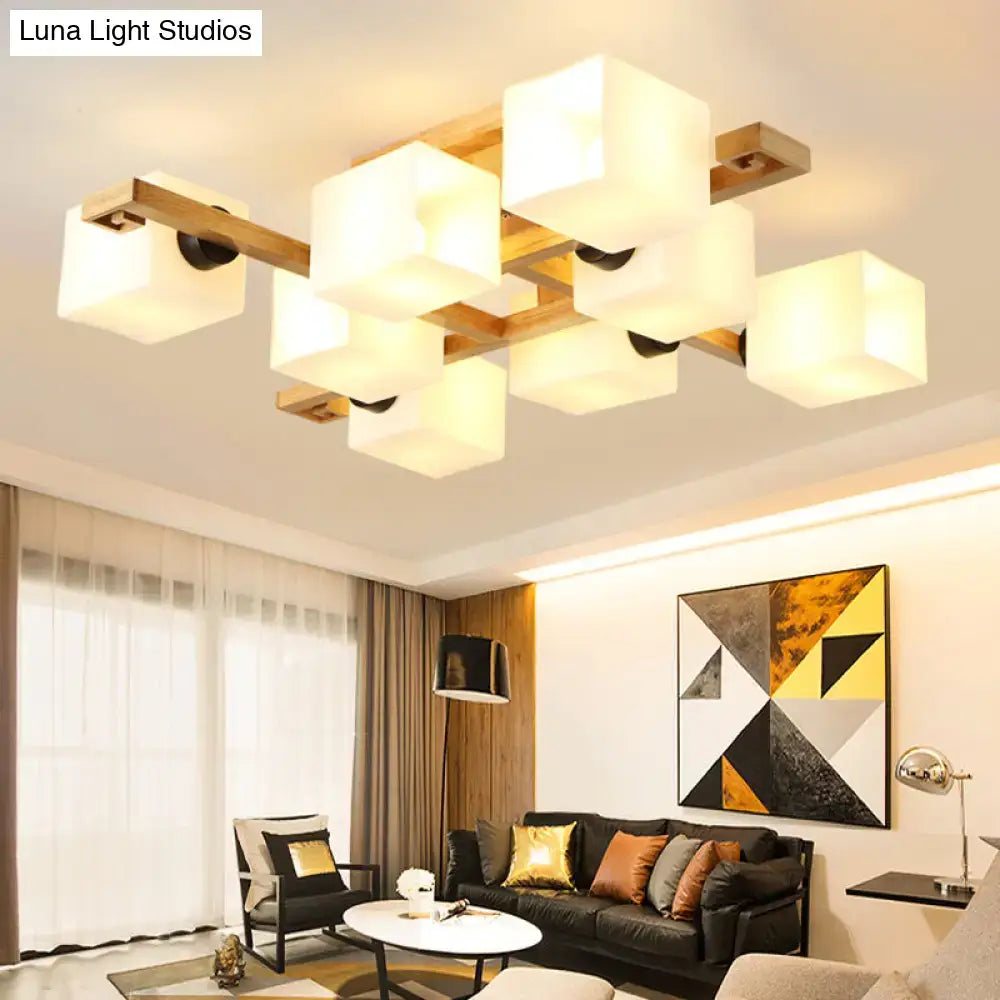 Modern geometric DecorBites™ flush mount chandelier with warm white glass cubes and natural wood canopy for living room lighting