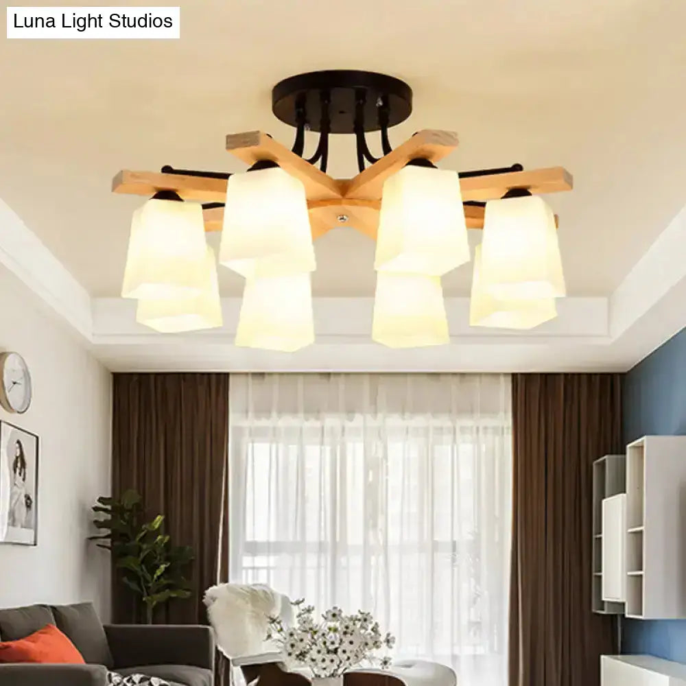 Modern wood and black semi flush mount living room light with six warm-toned milk glass shade frosted glass shades