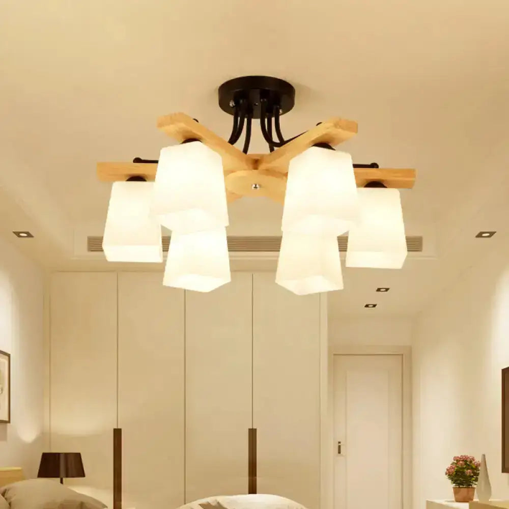 Modern wood and black semi flush mount living room light with milk glass shade and five frosted white glass arms