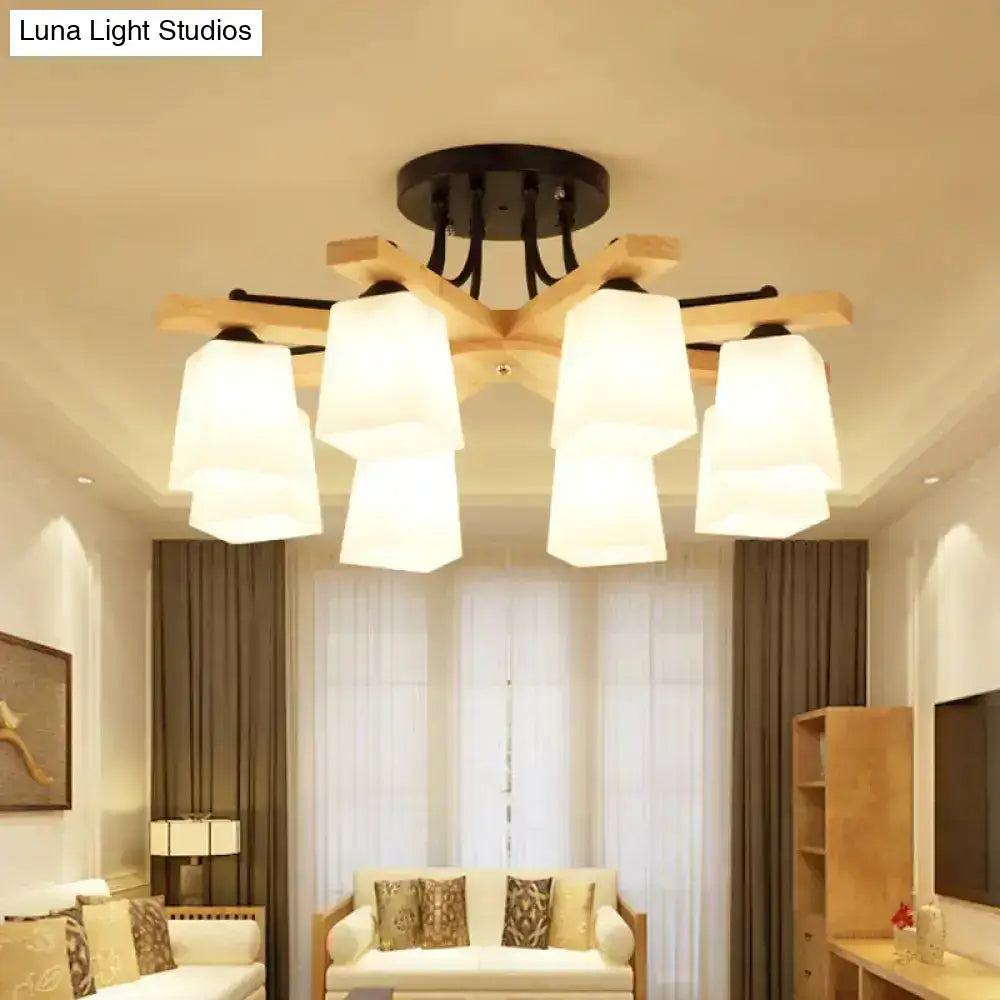 Modern wood and black semi flush mount chandelier with six off-white milk glass shades for living room lighting