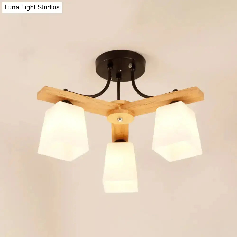 Modern wood and black semi flush mount living room light with milk glass shades and natural wood crossbar