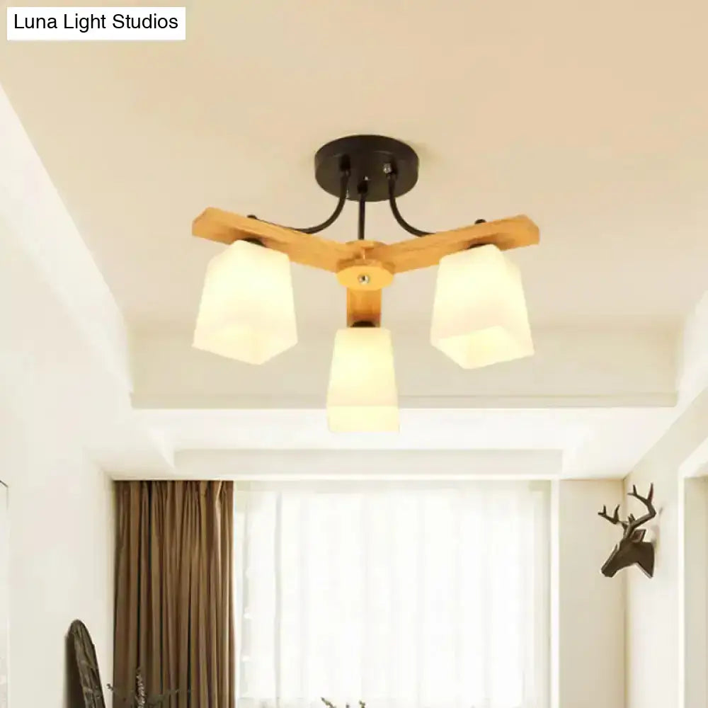 Modern wood and black semi flush mount living room light with milk glass shade and warm frosted glass illumination