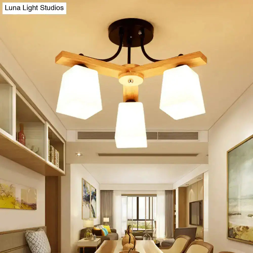 Modern three-light semi flush mount ceiling fixture with natural wood frame and milk glass shade for living room lighting