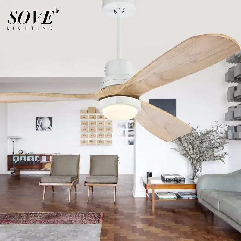 A modern wood ceiling fan with light wood blades and white housing featuring an integrated led lamp for living room