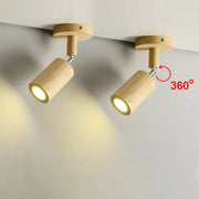 Modern wood ceiling light with two adjustable beige spotlights featuring textured cylindrical wooden bodies for living room