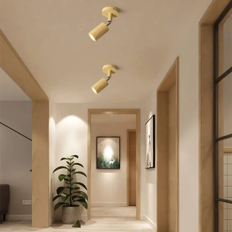 Modern wood ceiling light featuring two adjustable beige spotlights with a bamboo finish for living room use