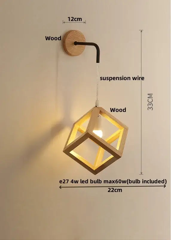 Modern wood cube led wall lights featuring a minimalist wooden cube pendant with black metal arm and illuminated led bulb