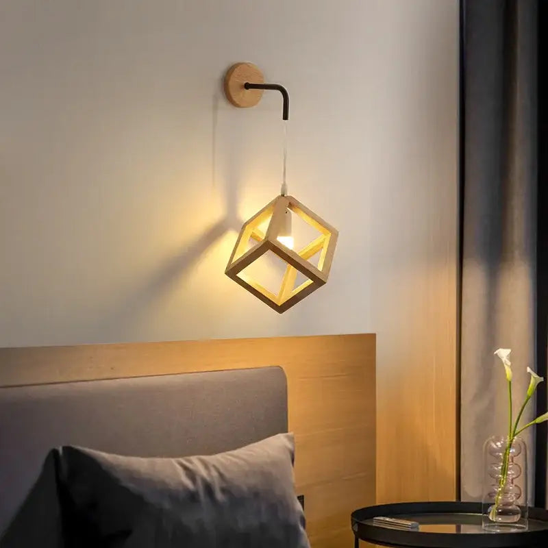 Modern wood cube led wall light with warm-toned wooden cube and metal arm for bedroom sconce wall lights design