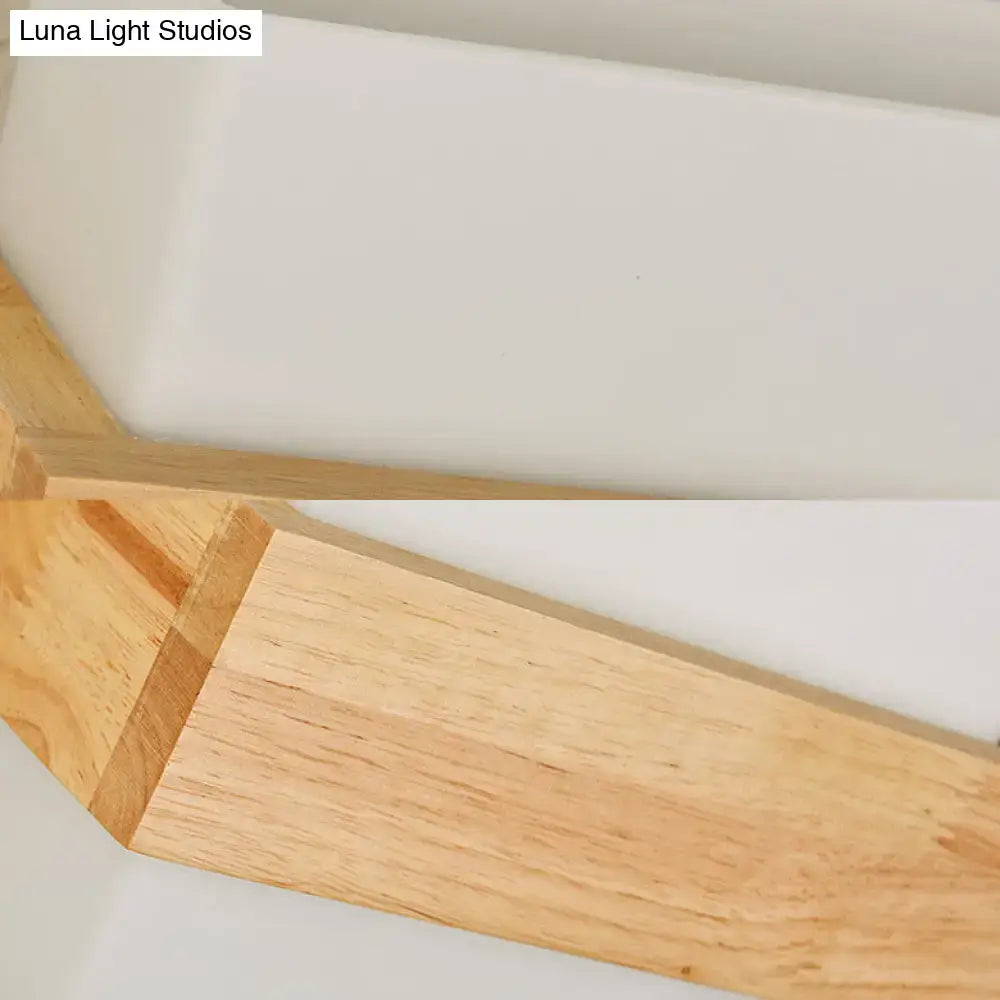 Lightweight wooden shelf with smooth natural finish and clean edges complements modern wood deco milk glass wall lamp