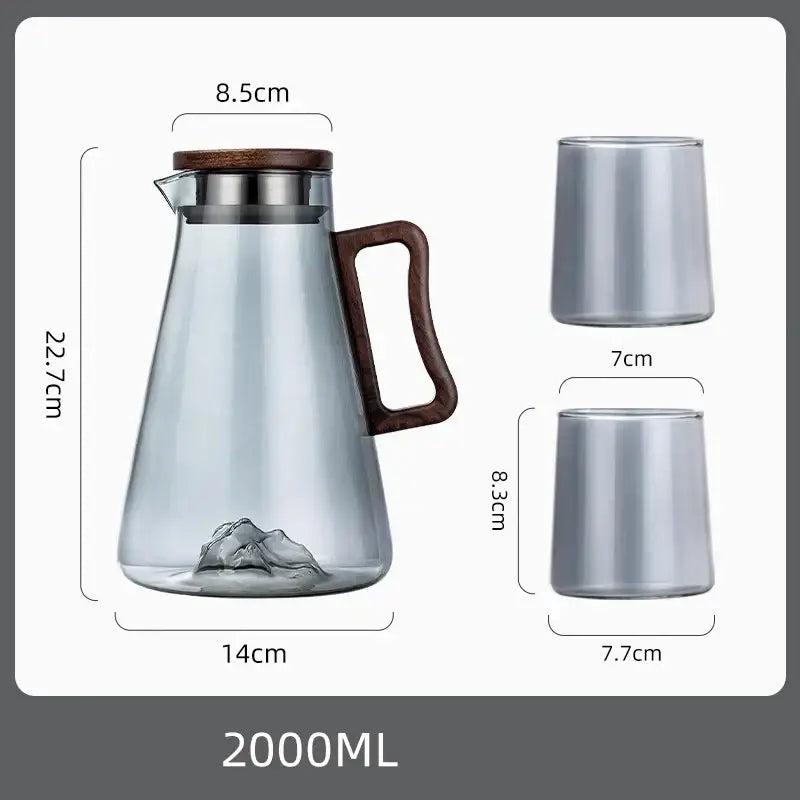 2000ml transparent glass cold water jug with modern wood handle and lid, accompanied by two metallic tumblers