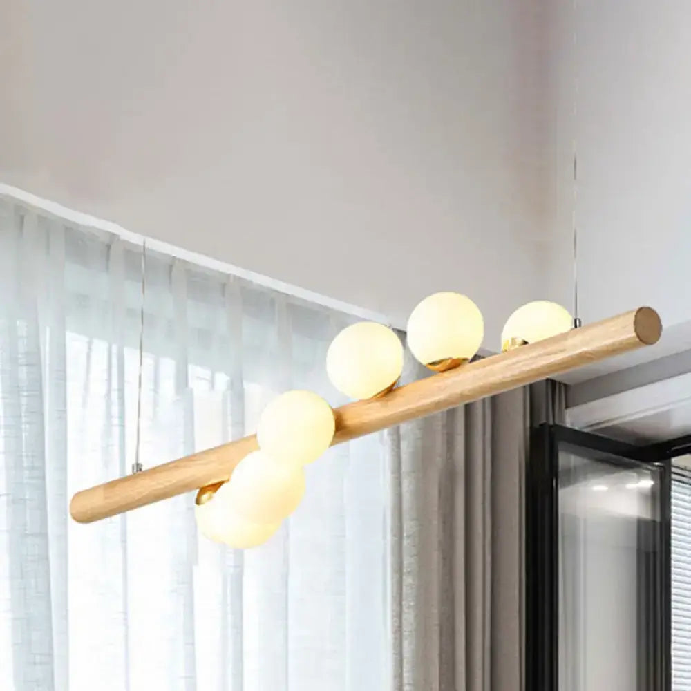 DecorBites modern wood ceiling light with opal glass globes and natural wood rod for dining room fixture height adjustment