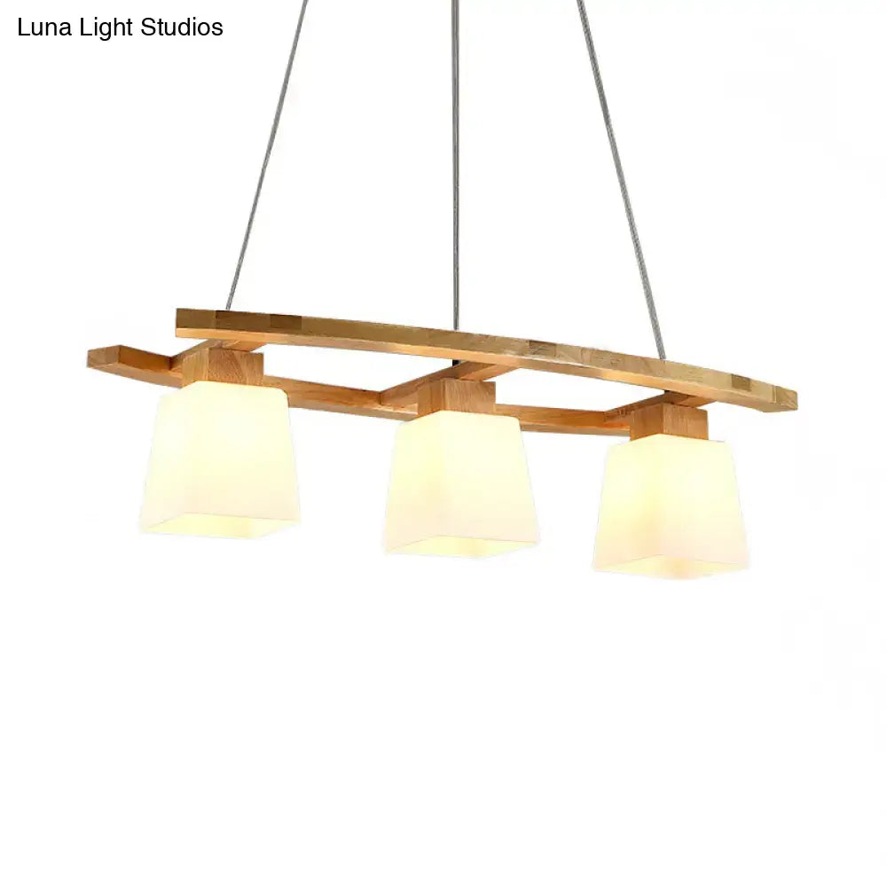 DecorBites™ Nordic hang lamp with modern wooden frame and three warm-toned frosted glass shades for dining lighting