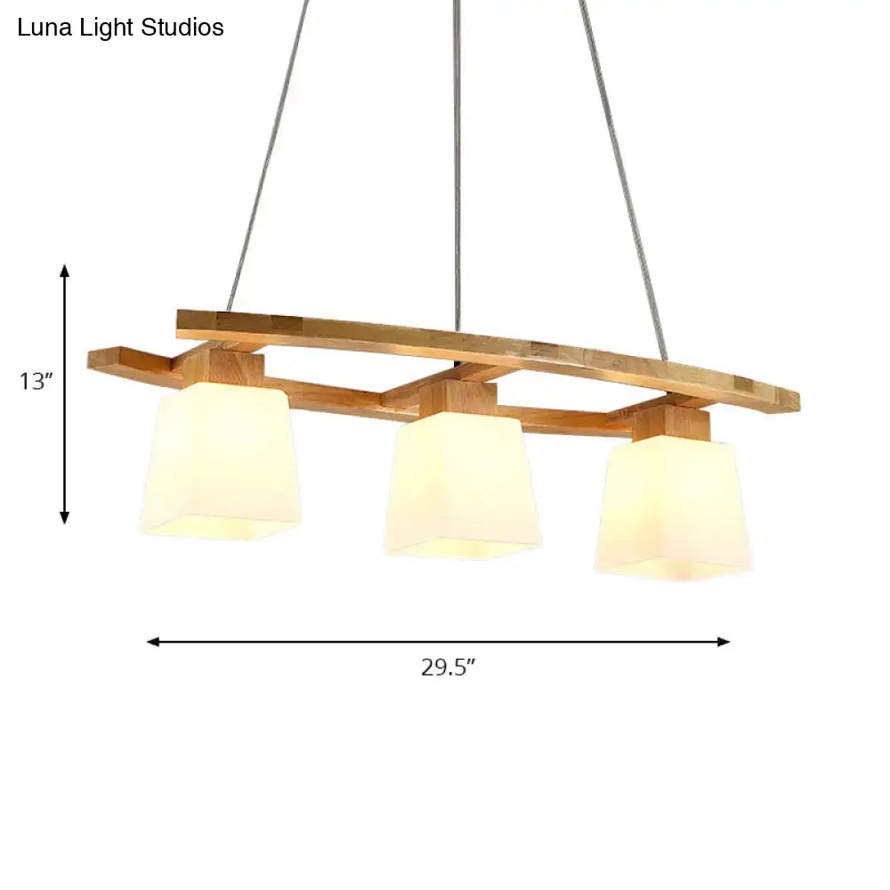 DecorBites Nordic hang lamp with three warm-toned frosted glass shades and wooden accents for dining room lighting