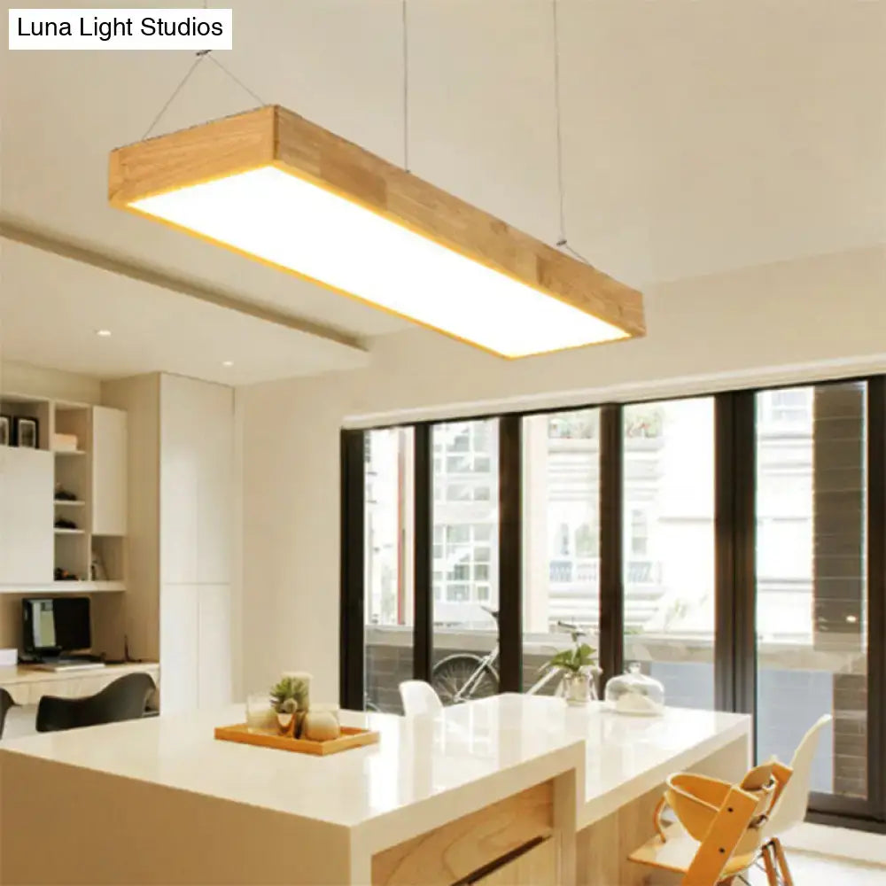 Modern wood rectangle ceiling light fixture with natural wood frame and warm glowing center in white warm third gear