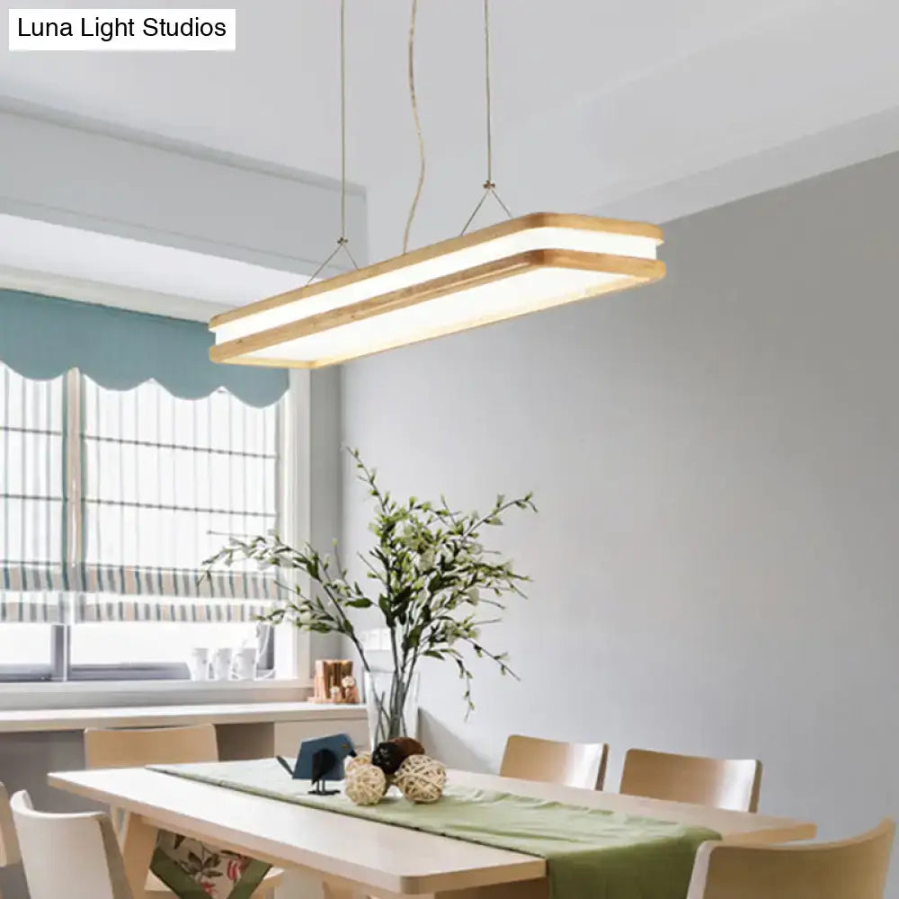 Modern wood rectangular hanging island lamp with natural wood frame and integrated led lighting for dining room