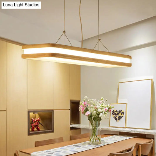 Modern wood rectangular hanging island lamp with warm wood finish frame and integrated led strip lighting for dining room