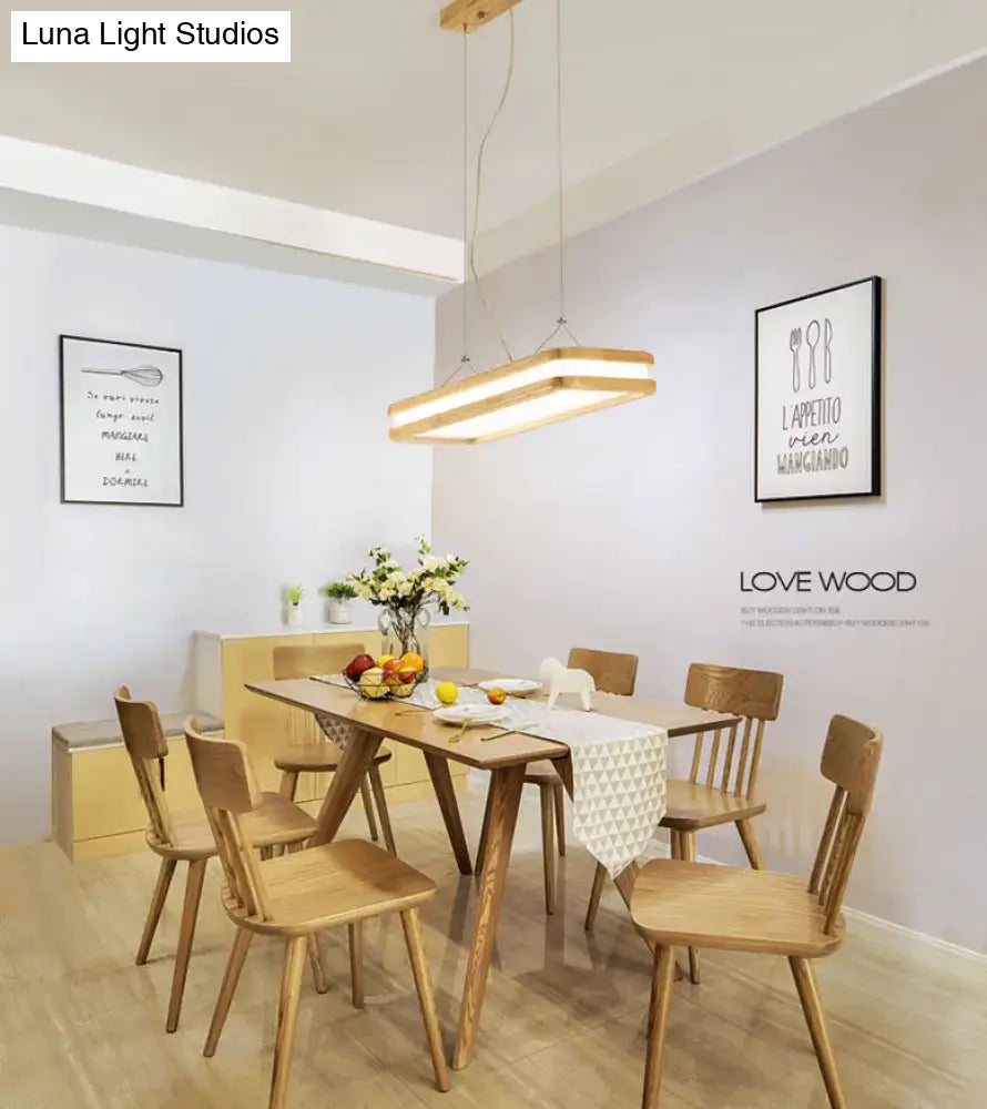 Modern wood rectangular hanging island lamp with wooden frame and warm glowing illumination for dining room