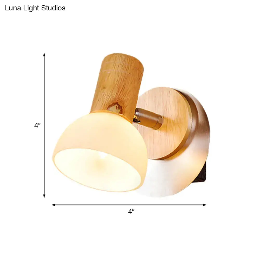 Modern wood sconce with warm-toned wooden base and milk white glass dome lampshade for bedroom wall lighting