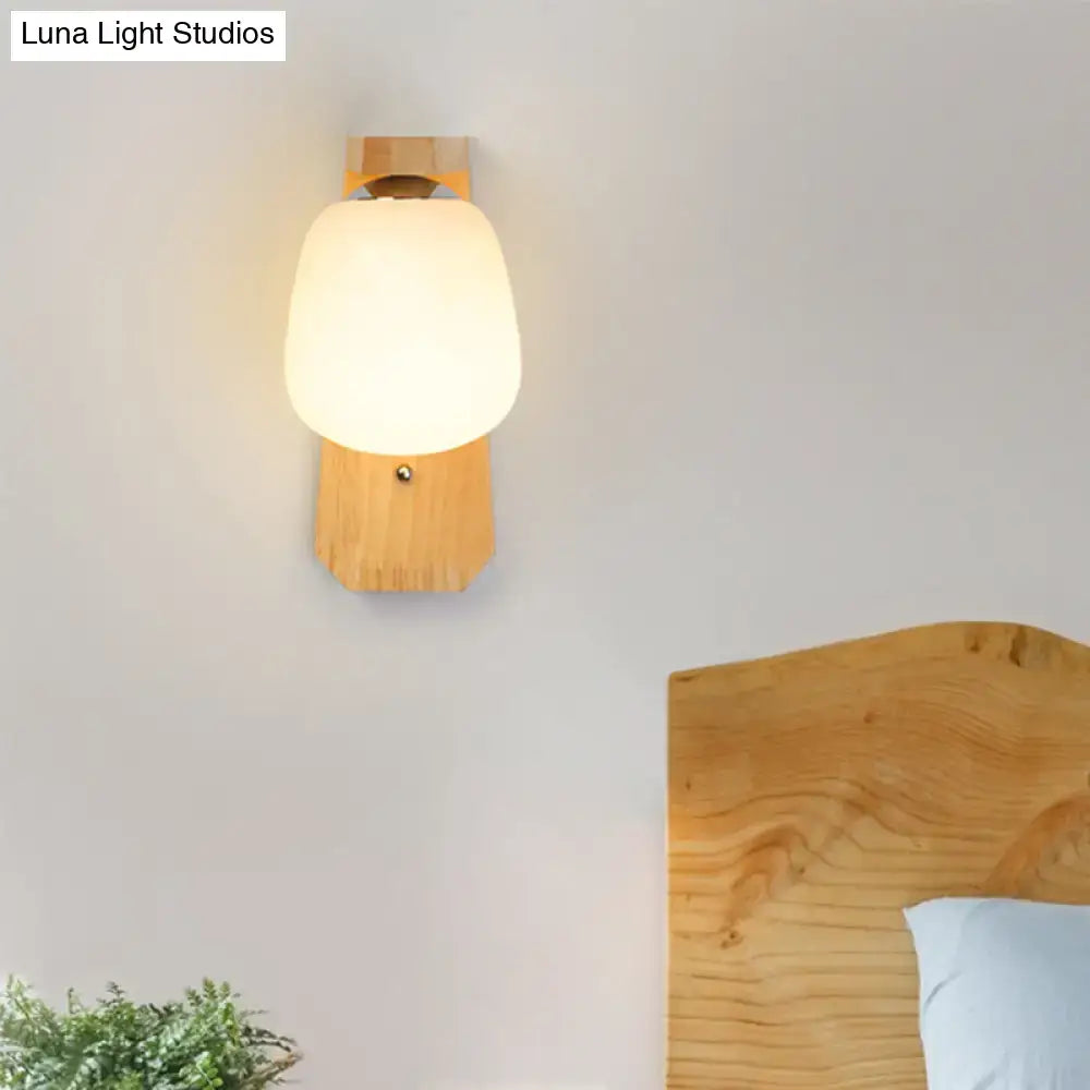 Modern wooden wall lamp with warm-toned frosted milky glass globe and natural wood base 220v-240v fixture type