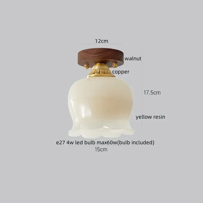 A modern off-white yellow resin lampshade with fluted edge and brass copper base on walnut disc for ceiling lights decorbites led wicker wood