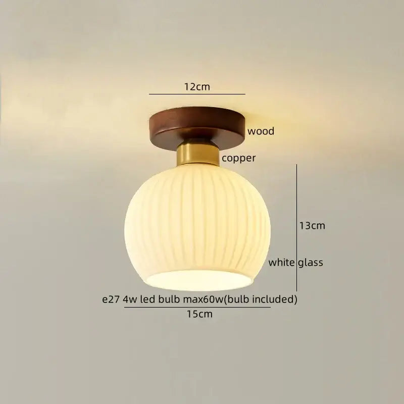 A warm-toned white glass pendant ceiling light with vertical ridges and copper stem for modern decorbites led wicker use