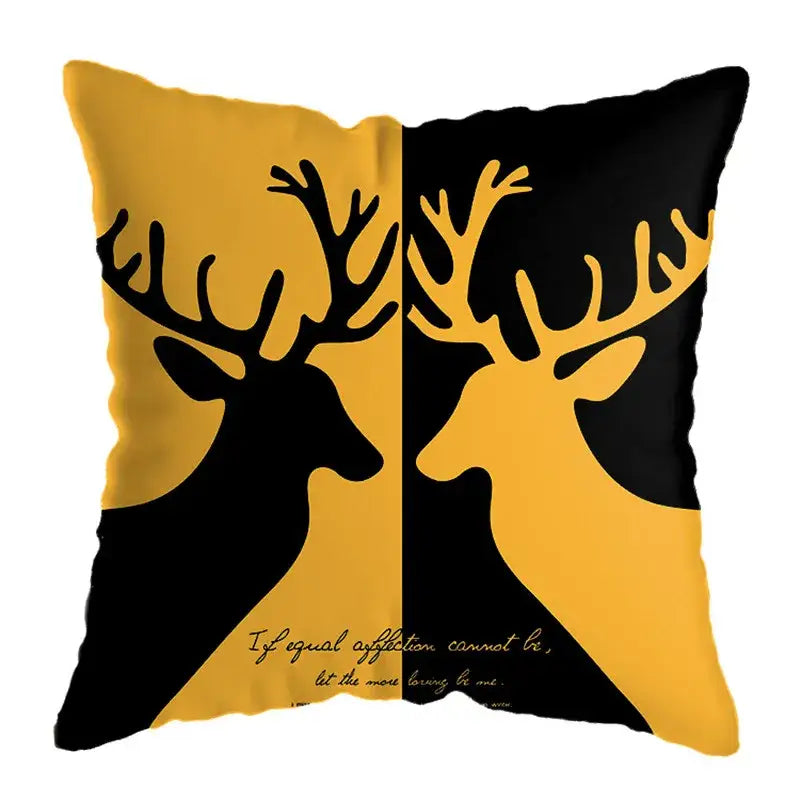 Modern yellow and black geometric deer print throw pillow with two deer silhouettes and elegant script for living room decor