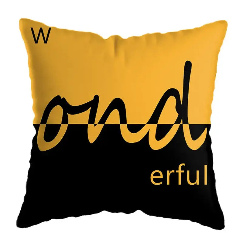 Modern yellow and black throw pillow with geometric deer print and wonderful in bold script for living room decor
