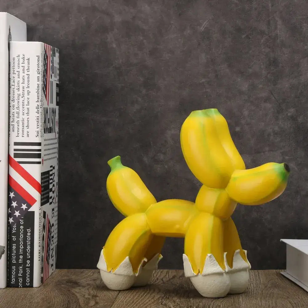 Modern yellow banana balloon dog sculpture with white eggshell feet for living room pop art decor