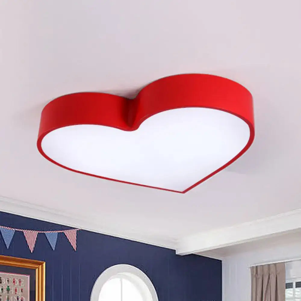 Red heart-shaped led flush mount ceiling light with white illuminated center and romantic acrylic design for bedrooms