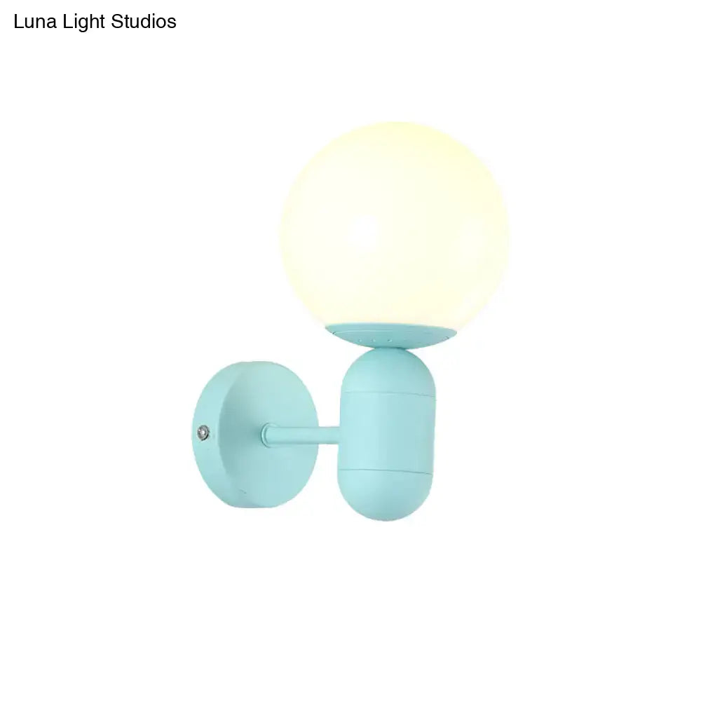 Pastel blue spherical wall sconce with frosted glass globe metal fixture suitable for 110v-120v and 220v-240v use