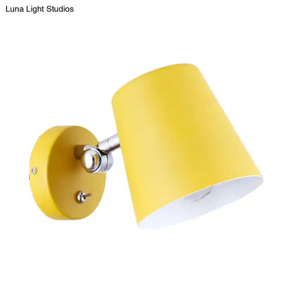 Modern yellow conical sconce light with metal shade matte finish and chrome hardware for bedroom use